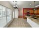 Bright kitchen boasts stainless steel appliances, granite countertops, and an eat-in dining area at 86 Old Barge Dr., Pawleys Island, SC 29585