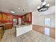 Spacious kitchen with granite countertops, stainless appliances, and tiled flooring at 86 Old Barge Dr., Pawleys Island, SC 29585