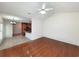 Open-concept living area with hardwood floors, leading into the spacious kitchen at 86 Old Barge Dr., Pawleys Island, SC 29585