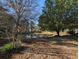 Scenic view of a pond surrounded by lush trees at 86 Old Barge Dr., Pawleys Island, SC 29585