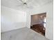 Cozy sunroom with neutral carpet and an entrance to the living room at 86 Old Barge Dr., Pawleys Island, SC 29585