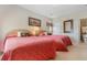 Cozy bedroom featuring two beds with colorful bedspreads, decorative pillows, and warm lighting at 9764 Leyland Dr. # 9764 - 5, Myrtle Beach, SC 29572