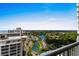 Aerial view of a beautiful lakeside community with lush greenery and a clear blue sky at 9994 Beach Club Dr. # 1904, Myrtle Beach, SC 29572