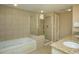 Spacious bathroom with a walk-in shower and separate jacuzzi tub at 9994 Beach Club Dr. # 1904, Myrtle Beach, SC 29572