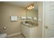 Bathroom featuring a granite countertop vanity with neutral wall paint and tile flooring at 9994 Beach Club Dr. # 1904, Myrtle Beach, SC 29572