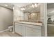 Elegant bathroom featuring double sinks, granite countertops, and a glass-enclosed shower at 9994 Beach Club Dr. # 1904, Myrtle Beach, SC 29572