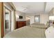 Comfortable bedroom with two beds, dresser, TV, and a door leading to the balcony with ocean views at 9994 Beach Club Dr. # 1904, Myrtle Beach, SC 29572