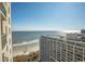 Beautiful ocean view with sandy beach from the building's window on a sunny day at 9994 Beach Club Dr. # 1904, Myrtle Beach, SC 29572