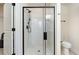 Modern bathroom with a glass-enclosed shower stall and a white toilet at 1219 Inlet View Dr., North Myrtle Beach, SC 29582