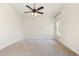 Spacious bedroom with neutral carpet, a ceiling fan, and a window at 1219 Inlet View Dr., North Myrtle Beach, SC 29582