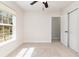 Bedroom featuring a window, a closet, and neutral carpet at 1219 Inlet View Dr., North Myrtle Beach, SC 29582