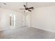 Carpeted bedroom with a ceiling fan and access to the closet and bathroom at 1219 Inlet View Dr., North Myrtle Beach, SC 29582