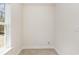 Small closet with carpeted floor and a window providing natural light at 1219 Inlet View Dr., North Myrtle Beach, SC 29582