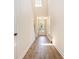 Inviting foyer with tall ceilings, wood-look flooring, and natural light streaming through the front door at 1219 Inlet View Dr., North Myrtle Beach, SC 29582