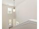 Bright foyer with a high ceiling, a pendant light, and a front door at 1219 Inlet View Dr., North Myrtle Beach, SC 29582