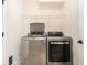 Modern laundry room with a stainless steel washer and dryer set at 1219 Inlet View Dr., North Myrtle Beach, SC 29582