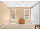 Neutral bedroom with two windows, closet space and carpet flooring at 324 Highfield Loop, Myrtle Beach, SC 29579
