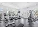 Bright gym with treadmills, elliptical machines, weight machines, and windows offering outside views at 324 Highfield Loop, Myrtle Beach, SC 29579