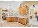 Bright kitchen featuring wooden cabinets, tile flooring, and stainless steel appliances at 324 Highfield Loop, Myrtle Beach, SC 29579