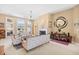 Comfortable living room with ample natural light, plush seating, and a cozy fireplace at 324 Highfield Loop, Myrtle Beach, SC 29579