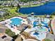 Aerial view of a resort-style pool area with multiple pools, water slides, and lounge chairs at 324 Highfield Loop, Myrtle Beach, SC 29579