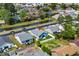 Scenic aerial view of a single-story home in a community with a pond and well-maintained landscaping at 361 Rycola Circle, Myrtle Beach, SC 29575