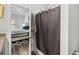 En-suite bathroom featuring a shower with a gray shower curtain at 361 Rycola Circle, Myrtle Beach, SC 29575