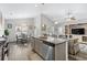Open concept kitchen overlooks the dining and living areas, creating a seamless flow for entertaining at 361 Rycola Circle, Myrtle Beach, SC 29575
