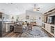 Comfortable living room with vaulted ceilings, open floor plan, and a combined kitchen and dining area at 361 Rycola Circle, Myrtle Beach, SC 29575