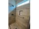 Modern shower with gray tile, built in niche, and a rain-style shower head at 361 Rycola Circle, Myrtle Beach, SC 29575