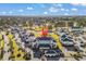 Overhead aerial shot of residences, golf course, ponds, parking areas, and lush vegetation in a well-maintained community at 4827 Orchid Way # 301, Myrtle Beach, SC 29577