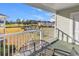 Inviting balcony view featuring outdoor seating, a community pool, golf course, and multi-story building, perfect for relaxed living at 4827 Orchid Way # 301, Myrtle Beach, SC 29577