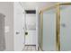 Bathroom with a shower, in-closet washer and dryer, and white walls at 4827 Orchid Way # 301, Myrtle Beach, SC 29577