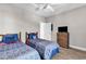 Bedroom featuring two beds, hardwood floors, and light-colored walls at 4827 Orchid Way # 301, Myrtle Beach, SC 29577