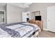 This bedroom is complete with a vaulted ceiling, a ceiling fan, and a dresser at 4827 Orchid Way # 301, Myrtle Beach, SC 29577