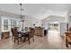 Open living space featuring a dining area, living room, and a seamless flow to the outdoor patio at 4827 Orchid Way # 301, Myrtle Beach, SC 29577