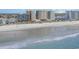 Beautiful aerial shot of beachfront condos with wide sandy beach, Atlantic ocean views at 501 S Ocean Blvd. # 1002, North Myrtle Beach, SC 29582