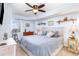 Bedroom with a queen size bed, two end tables, and access to a balcony at 501 S Ocean Blvd. # 1002, North Myrtle Beach, SC 29582