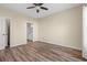 Bedroom with wood-look flooring that provides access to the ensuite bathroom at 5022 Belleglen Ct. # 202, Myrtle Beach, SC 29579