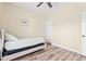 Bedroom featuring wood-look flooring, a ceiling fan, and a small bed at 5022 Belleglen Ct. # 202, Myrtle Beach, SC 29579
