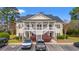 Inviting condo with private balconies and ample parking in a well-maintained community at 5022 Belleglen Ct. # 202, Myrtle Beach, SC 29579