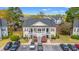 Exterior aerial view of a two-story condominium unit with parking at 5022 Belleglen Ct. # 202, Myrtle Beach, SC 29579