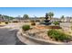 Outdoor view of community water fountain surrounded by lush landscaping at 5022 Belleglen Ct. # 202, Myrtle Beach, SC 29579