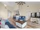 Comfortable living room with wood flooring, vaulted ceiling, and seamless kitchen access at 5022 Belleglen Ct. # 202, Myrtle Beach, SC 29579