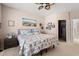 Bedroom with neutral walls, carpet, ceiling fan and view of closet at 542 Sand Ridge Rd., Conway, SC 29526