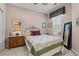 Inviting bedroom featuring a comfortable bed, side table, and a decorative mirror at 542 Sand Ridge Rd., Conway, SC 29526