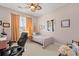 Comfortable bedroom complete with natural light, ceiling fan, and a cozy bed at 542 Sand Ridge Rd., Conway, SC 29526