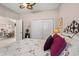 Cozy main bedroom with a comfortable bed, closet, and view into the dining room at 542 Sand Ridge Rd., Conway, SC 29526