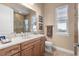 Bathroom with a wood vanity, white counter top, and a shower with glass doors at 7268 Seville Dr., Myrtle Beach, SC 29572