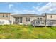 Fenced backyard with a patio, perfect for Gathering gatherings and outdoor activities at 1016 Laurens Mill Dr., Myrtle Beach, SC 29579